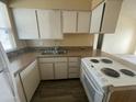 Bright kitchen features essential appliances and offers plenty of counter space for meal preparation at 6832 W Vogel Ave, Peoria, AZ 85345