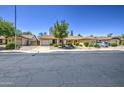 Charming single-story home with a well-manicured, low maintenance front yard and private two car garage at 2845 E Irwin Ave, Mesa, AZ 85204