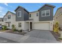 Beautiful two-story home boasting neutral stucco, modern grey siding accents, and an attached two-car garage at 6434 N 17Th St, Phoenix, AZ 85016
