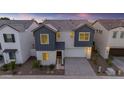 Attractive two-story home showcasing grey accents, low maintenance landscaping and a convenient two-car garage at 6434 N 17Th St, Phoenix, AZ 85016
