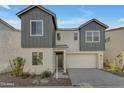 Well-maintained two-story home exhibiting neutral stucco, complementary grey siding, and a spacious two-car garage at 6434 N 17Th St, Phoenix, AZ 85016