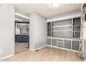 Open dining area with built-in cabinets and a view into the kitchen at 7807 E Main St # Cc-71, Mesa, AZ 85207