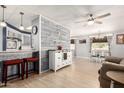 Open-concept living space featuring a modern kitchen and stylish decor at 7807 E Main St # Cc-71, Mesa, AZ 85207