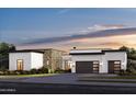 Modern home featuring stone accents, a two-car garage, and beautiful landscaping at 8300 E Dixileta Dr # 306, Scottsdale, AZ 85266