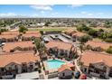 Aerial view showing community pool and outdoor areas for condo complex at 839 S Westwood -- # 154, Mesa, AZ 85210