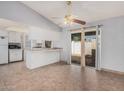 Open dining area with tile floors and sliding glass doors to the patio at 17830 N 45Th Ave, Glendale, AZ 85308
