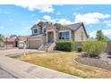 View of the home's exterior showcasing manicured landscaping and inviting front entrance at 1903 E Jasper Dr, Chandler, AZ 85225