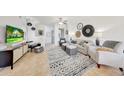 Inviting living room featuring stylish furnishings, a patterned rug, and plenty of natural light at 2402 E 5Th St # 1520, Tempe, AZ 85288