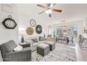 Bright living room with neutral decor, modern accents, and a view into the dining area at 2402 E 5Th St # 1520, Tempe, AZ 85288