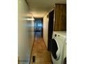 Well-lit hallway features tile flooring and provides access to other areas of the home at 3104 E Broadway Rd # 295, Mesa, AZ 85204