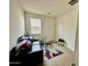 This flex space offers versatile usage, featuring neutral paint, carpet, and natural light at 9825 W Trumbull Rd, Tolleson, AZ 85353