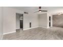 Spacious room showcasing tile flooring and multiple entryways enhancing the openness at 1010 W 5Th Pl, Mesa, AZ 85201