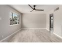 Bright and spacious living area with tile flooring and a large window for natural light at 1010 W 5Th Pl, Mesa, AZ 85201