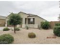 Attractive single-story home with well-maintained desert landscaping in the front yard at 1246 E Thomas Dr, Casa Grande, AZ 85122