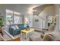Bright living room featuring neutral walls, a piano and comfortable seating at 1697 E Linda Ln, Gilbert, AZ 85234