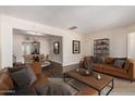 Spacious living room with hardwood floors and designer furnishings at 2807 N 8Th Ave, Phoenix, AZ 85007