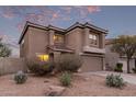 Charming two-story home featuring desert landscaping and a tile roof at 7500 E Deer Valley Rd # 157, Scottsdale, AZ 85255