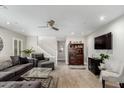 Open concept living room featuring a ceiling fan and hardwood floors at 7500 E Deer Valley Rd # 157, Scottsdale, AZ 85255