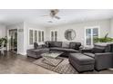 Bright and airy living room featuring neutral walls and a large sectional sofa at 7500 E Deer Valley Rd # 157, Scottsdale, AZ 85255