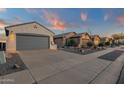 A row of houses showcases desert landscaping and well-maintained exteriors, perfect for curb appeal at 10775 E Peralta Canyon Dr, Gold Canyon, AZ 85118