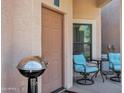 View of the outdoor patio with a grill and comfortable seating area at 16357 E Arrow Dr # 115, Fountain Hills, AZ 85268