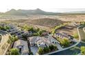 Panoramic aerial view showcasing the neighborhood and surrounding desert landscape at 2556 E Quiet Hollow Ln, Phoenix, AZ 85024