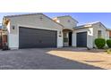 Spacious attached garage with extended driveway and easy access at 2618 E Stacey Rd, Gilbert, AZ 85298