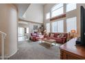 Spacious living room with high ceilings and lots of natural light at 4912 W Marco Polo Rd, Glendale, AZ 85308