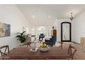 Bright living area boasts high ceilings, large windows, and modern decor, creating an inviting and spacious atmosphere at 10105 E Larkspur Dr, Scottsdale, AZ 85260