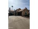 Charming single-story home with a well-maintained yard, neutral color palette, and a two car garage at 16805 S 29Th Pl, Phoenix, AZ 85048