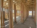 Interior view showcasing the framework and layout of the rooms in this home under construction at 2336 E Homesteader Rd, San Tan Valley, AZ 85140