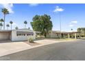 Relaxing exterior with a desert landscaped yard and covered parking for your convenience at 9501 E Broadway Rd # Ofc, Mesa, AZ 85208