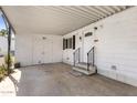 Covered entry with outdoor storage and entry door with steps for easy access to your home at 9501 E Broadway Rd # Ofc, Mesa, AZ 85208