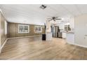 Bright, open-concept living space flows seamlessly into the kitchen with updated appliances and finishes at 9501 E Broadway Rd # Ofc, Mesa, AZ 85208