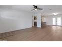 Bright living room with hardwood floors and view into modern kitchen area at 1205 W 7Th St, Tempe, AZ 85281