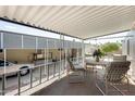 Comfortable covered patio with seating area, ideal for relaxation and entertaining guests at 205 S Higley Rd # 293, Mesa, AZ 85206