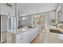 Island in gourmet kitchen featuring granite countertops, modern appliances, and an adjacent breakfast nook at 3624 N Paseo Del Sol --, Mesa, AZ 85207