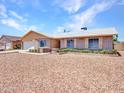 Charming single-story home features a xeriscaped front yard, brick accents, and a bright and welcoming entrance at 13810 N 39Th Ave, Phoenix, AZ 85053