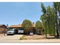 Charming single-story home featuring a welcoming entrance and well-maintained landscaping at 3531 W Libby St, Glendale, AZ 85308