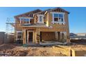 Two-story home under construction featuring a framed elevation with visible beams and window openings at 4288 E Kolin Ln, San Tan Valley, AZ 85143