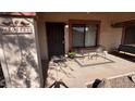 Charming front porch with seating area, offering a welcoming entrance at 1440 N Idaho Rd # 1022, Apache Junction, AZ 85119