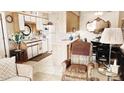 Cozy eat-in kitchen has white cabinets and updated appliances, offering a comfortable and functional space for cooking at 1440 N Idaho Rd # 1022, Apache Junction, AZ 85119