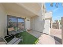 Inviting patio with seating; a great entry with a 'good day' welcome mat adds a personal touch at 850 S River Dr # 1047, Tempe, AZ 85281