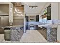 Modern kitchen featuring stainless steel appliances, custom cabinets, and granite countertops at 17421 N 14Th St, Phoenix, AZ 85022