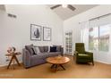 Inviting living area with neutral decor, a comfortable sofa, and lots of natural light at 7008 E Gold Dust Ave # 236, Scottsdale, AZ 85253