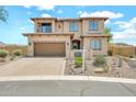 Charming two-story home with a well-manicured front yard at 9017 E June Cir, Mesa, AZ 85207