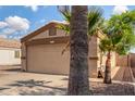 Attractive single-story home boasting easy-care landscaping and an attached two-car garage at 1507 W Mesquite Ave, Apache Junction, AZ 85120