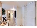 Inviting foyer with tiled floors and a conveniently located entry closet at 365 Leisure World --, Mesa, AZ 85206