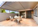 Outdoor patio with overhead covering, table and chairs at 365 Leisure World --, Mesa, AZ 85206