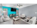 Spacious living room with modern furniture, stylish decor, and lots of light at 3723 W Columbine Dr, Phoenix, AZ 85029